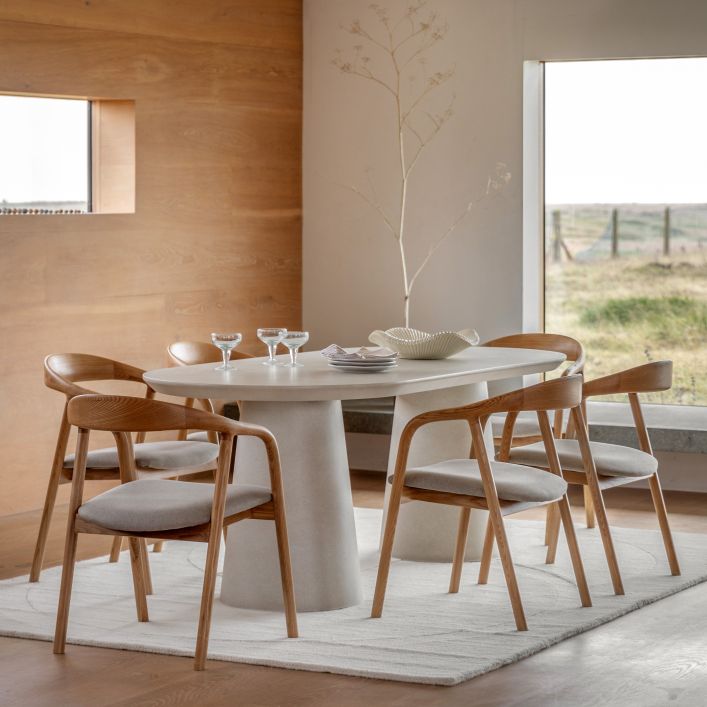Petra Sculptural Stone-Look Dining Table in Round or Oval