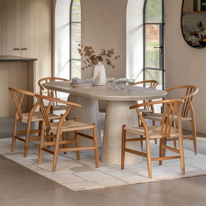 Petra Sculptural Stone-Look Dining Table in Round or Oval