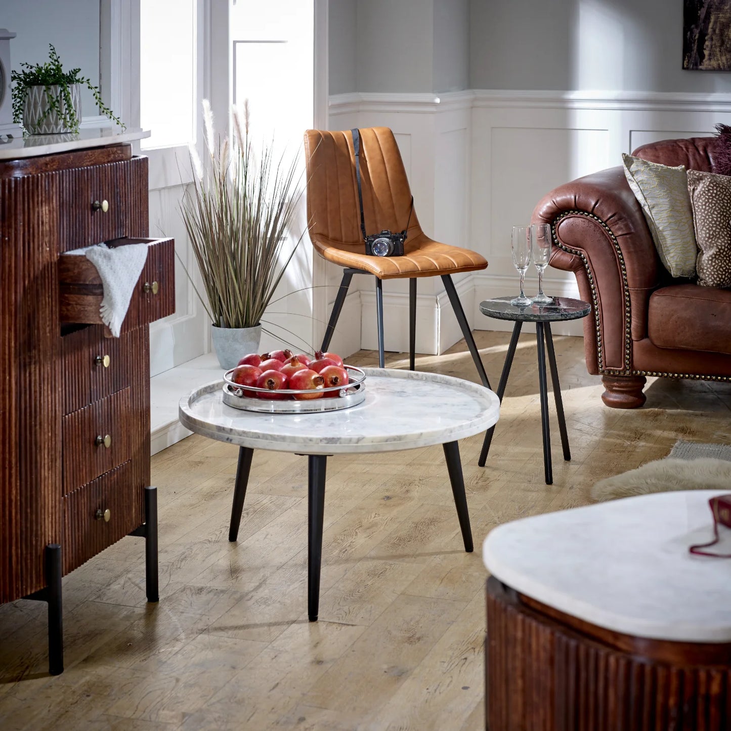 Aadhiya Round Marble Coffee Table with Sleek Metal Legs