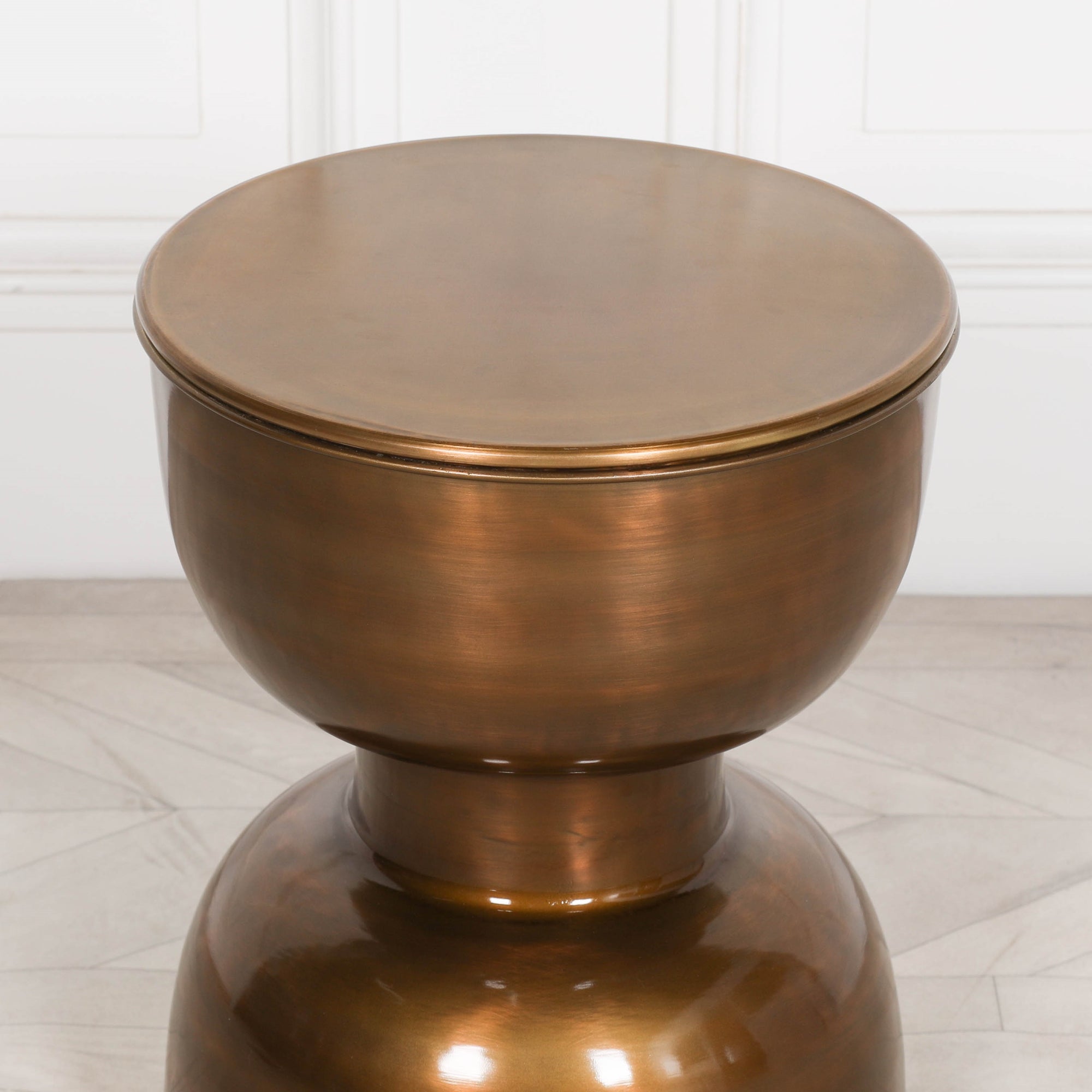 Round brass shop end table